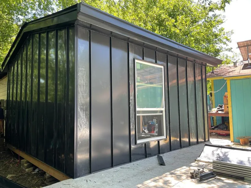 Black standing seam metal wall panels for Roof Inspection in Lake Norman of Iredell